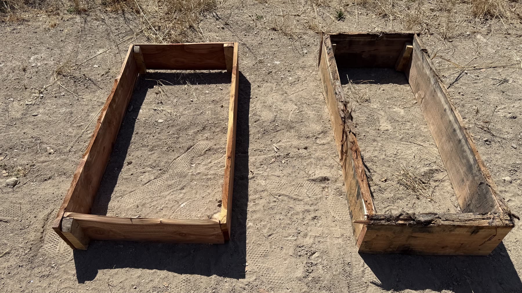 Two custom redwood planter boxes built side by side